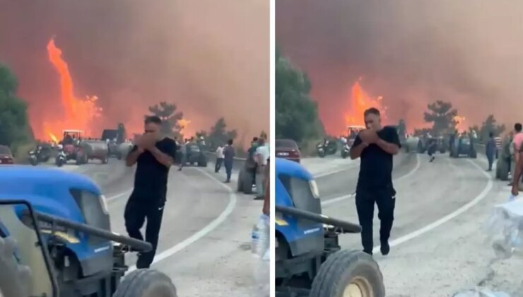 Alevlerin ortasında tepki çeken görüntüler! Orman kül olurken, o sigara yaktı
