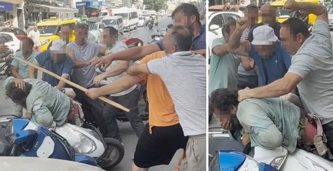 Yol ortasında yumruk ve sopalarla öldüresiye dövdüler